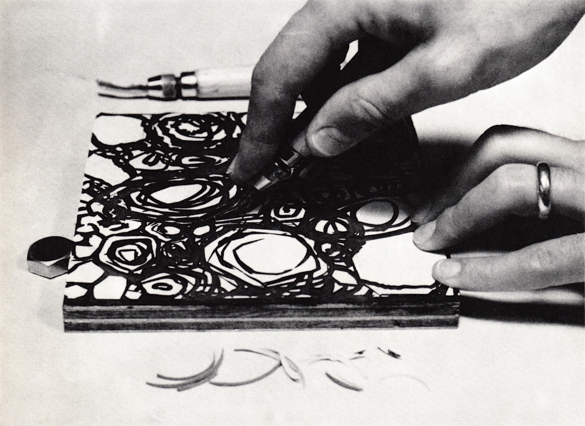 Cutting a linoleum block against a bolt head